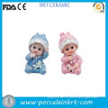 Cute baby girl or boy sitting Figurine Cake Toppers